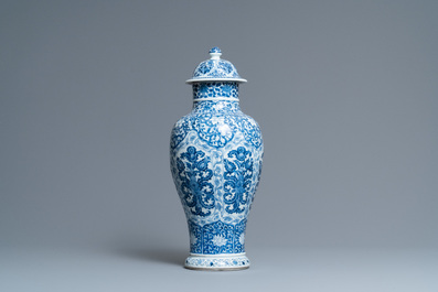 A Chinese blue and white vase and cover with floral design, Kangxi
