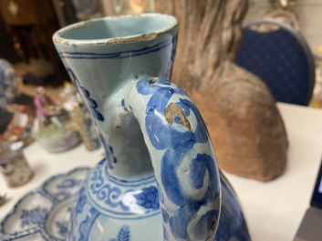 A large Dutch Delft blue and white chinoiserie ewer, 17th C.