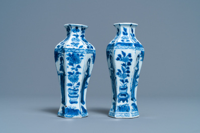 A pair of Chinese blue and white vases, a 'lotus' dish and four cups, Kangxi