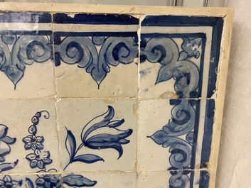 A blue and white Portuguese tile mural depicting an urn filled with flowers and fruits, 18th C.