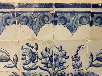 A blue and white Portuguese tile mural depicting an urn filled with flowers and fruits, 18th C.