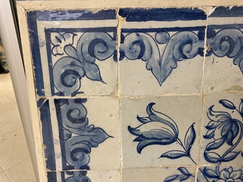 A blue and white Portuguese tile mural depicting an urn filled with flowers and fruits, 18th C.