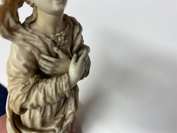 An ivory figure of a Madonna on wooden stand, Flanders or Germany, 17th C.