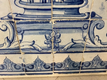 A blue and white Portuguese tile mural depicting an urn filled with flowers and fruits, 18th C.