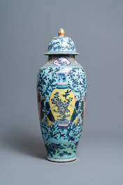 A very large Chinese famille rose turquoise-ground vase and cover, 19th C.