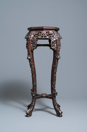 Two reticulated Chinese carved wooden stands, 19/20th C.