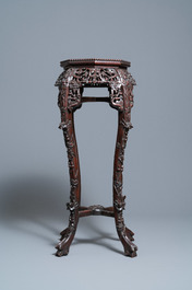 Two reticulated Chinese carved wooden stands, 19/20th C.