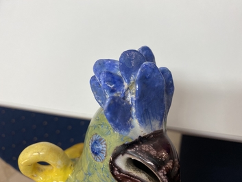 A polychrome Dutch Delft model of a parrot on a ring, 18th C.