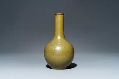 A Chinese monochrome teadust-glazed bottle vase, 19th C.