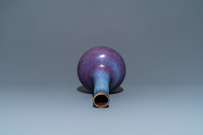 A Chinese flamb&eacute;-glazed bottle vase, Kangxi mark, 19th C.