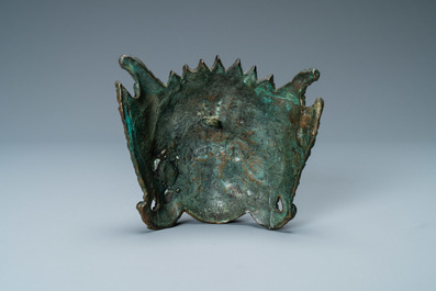 Un masque d'une d&eacute;esse en bronze, Tibet ou Asie du Sud-Est, 19&egrave;me