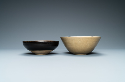A Chinese black-glazed Cizhou bowl and a cream-glazed incised bowl, Song and/or later