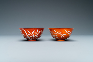 A pair of Chinese 'bamboo' coral red-ground bowls, Xuantong mark, Republic