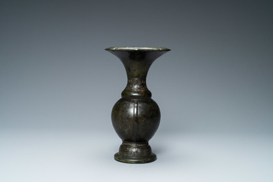 A Chinese bronze vase with incised taotie masks, Song/Yuan