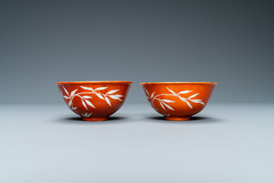 A pair of Chinese 'bamboo' coral red-ground bowls, Xuantong mark, Republic