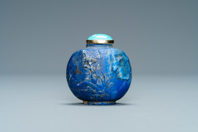 A Chinese lapis lazuli snuff bottle with gilt base, Qing