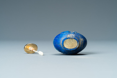 A Chinese lapis lazuli snuff bottle with gilt base, Qing