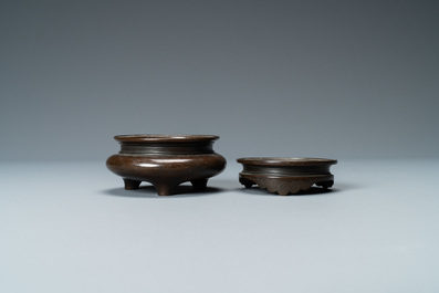 A Chinese enamelled silver figure, a silver vase, a silver-inlaid bronze censer and a silver-plated bronze box, 19/20th C.