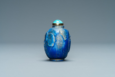 A Chinese lapis lazuli snuff bottle with gilt base, Qing