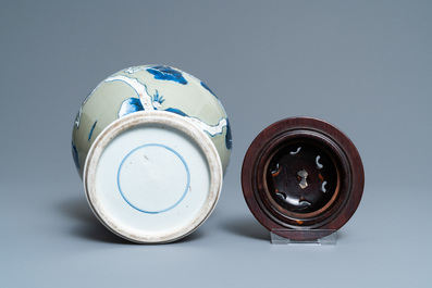 Un vase en porcelaine de Chine en bleu, blanc et rouge de cuivre &agrave; fond c&eacute;ladon, Kangxi