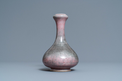 A pair of Chinese blue and white 'dragon' plates and a monochrome copper-red vase, Kangxi and later