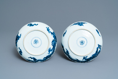 A pair of Chinese blue and white 'dragon' plates and a monochrome copper-red vase, Kangxi and later