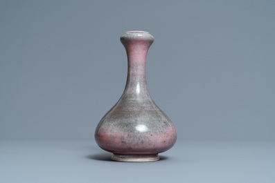 A pair of Chinese blue and white 'dragon' plates and a monochrome copper-red vase, Kangxi and later