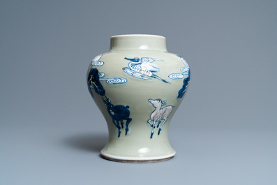 Un vase en porcelaine de Chine en bleu, blanc et rouge de cuivre &agrave; fond c&eacute;ladon, Kangxi
