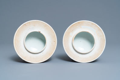 A pair of Chinese famille rose vases and covers, 19th C.