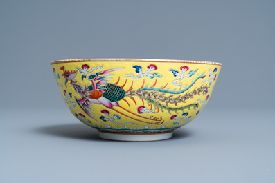 A Chinese yellow-ground famille rose 'dragon and phoenix' bowl, Xuantong mark and of the period