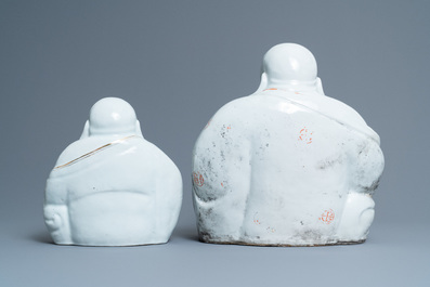 Five Chinese famille rose and white figures of Buddha, seal marks, 19/20th C.