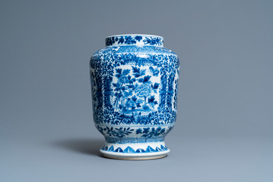 A Chinese blue and white 'birds and butterflies' vase, seal mark, 19th C.