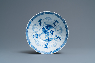 A Chinese blue and white lotus-molded 'Seven sages in the bamboo grove' bowl, Chenghua mark, Kangxi