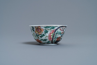 Une tasse et soucoupe armori&eacute;e en porcelaine de Chine famille rose, Yongzheng