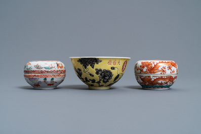 A Chinese Dayazhai yellow-ground bowl and two seal paste boxes, 19th C.