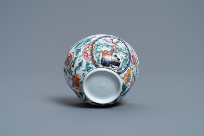 Une tasse et soucoupe armori&eacute;e en porcelaine de Chine famille rose, Yongzheng