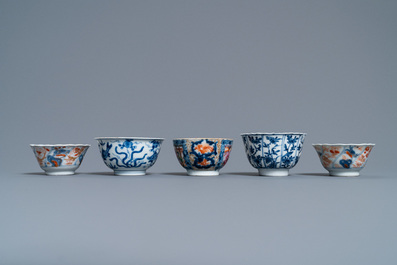 Five various Chinese cups and saucers and a small dish, Kangxi/Qianlong