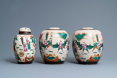 A pair of Chinese famille rose Nanking crackle-glazed jars and a jar with cover, 19th C.
