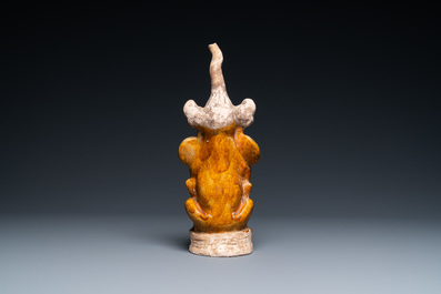 A Chinese sancai-glazed pottery 'earth spirit' figure, Tang