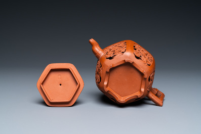 A Chinese reticulated double-walled Yixing stoneware teapot and cover, Kangxi