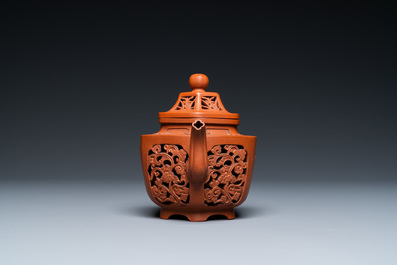 A Chinese reticulated double-walled Yixing stoneware teapot and cover, Kangxi