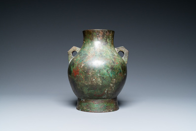 A Chinese archaistic bronze 'hu' vase with inscription, Ming