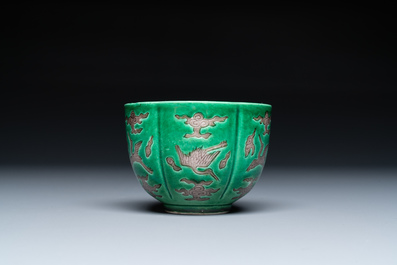 A Chinese aubergine- and green-glazed 'cranes' wine cup, 19/20th C.