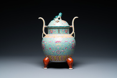 A Chinese famille rose tripod censer and cover, 19th C.
