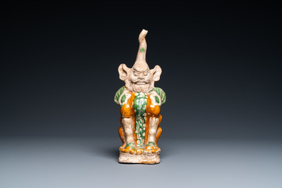 A Chinese sancai-glazed pottery 'earth spirit' figure, Tang