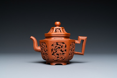 A Chinese reticulated double-walled Yixing stoneware teapot and cover, Kangxi