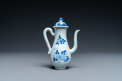 A Chinese blue and white ewer with floral design, Transitional period