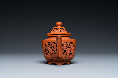 A Chinese reticulated double-walled Yixing stoneware teapot and cover, Kangxi