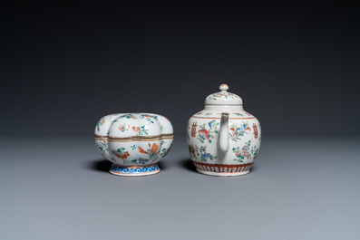 Seven Chinese famille rose saucers, a teapot and a covered box, 19th C.