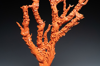 A large Chinese carved red coral group with birds on floral branches, 19/20th C.